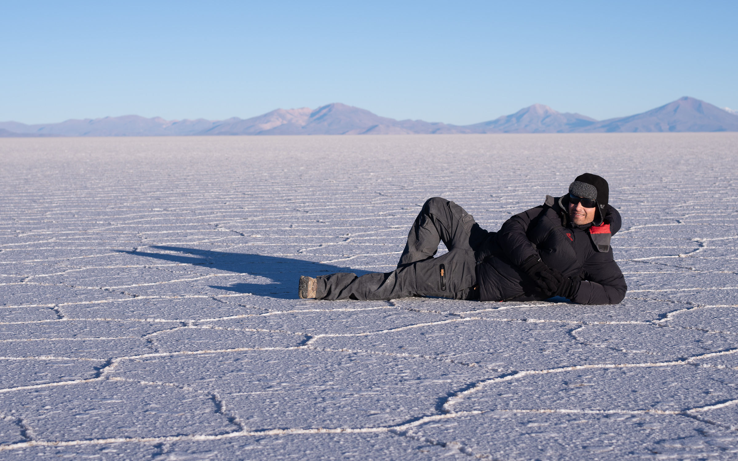 Robert Salisbury photographing on the Salar
